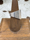 Bild in Galerie-Betrachter laden, Side view Sterling Silver Ribbed Statement Ring on wood block with cowhide background