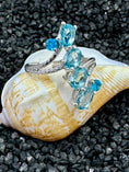 Bild in Galerie-Betrachter laden, Blue Topaz and Sterling Silver Ring in sea shell on black sand