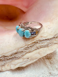 Load image into Gallery viewer, Larimar and Tanzanite Silver Ring on Seashell