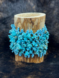 Load image into Gallery viewer, Handcrafted Turqoise Beaded Bracelet around a wood cup with dark fur background