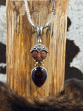 Load image into Gallery viewer, Sajen Goldstone and Citrine Pendant on cowhide background