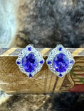 Load image into Gallery viewer, Sterling Silver and Amethyst Earrings on wood with fur background
