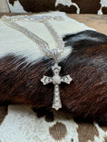 Load image into Gallery viewer, Diamond Chip and Sterling Silver Cross Pendant by Barbara Bixbie with silver chain on cowhide background