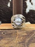 Load image into Gallery viewer, Sterling Silver and Cultured Freshwater Pearl Ring on brown stand with cowhide background