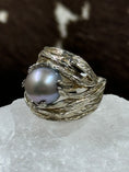 Load image into Gallery viewer, Sterling Silver and Cultured Freshwater Pearl Ring on white rock with brown background