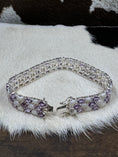 Load image into Gallery viewer, Genuine Opal and Amethyst Bracelet open showing clasp on white cowhide