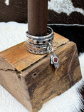 Bild in Galerie-Betrachter laden, Humsa Israel Ring from HSN Evine Designer on wood stand with cowhide background