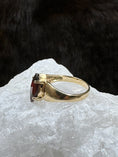 Load image into Gallery viewer, Side view of Goregous Diamond Swirl Ring on white rock and fur background