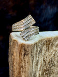 Load image into Gallery viewer, Goregous Genuine Diamond Swirl Ring on moose antler with fur background