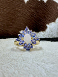 Load image into Gallery viewer, Tanzanite and Opal 10K Gold Ring on cowhide