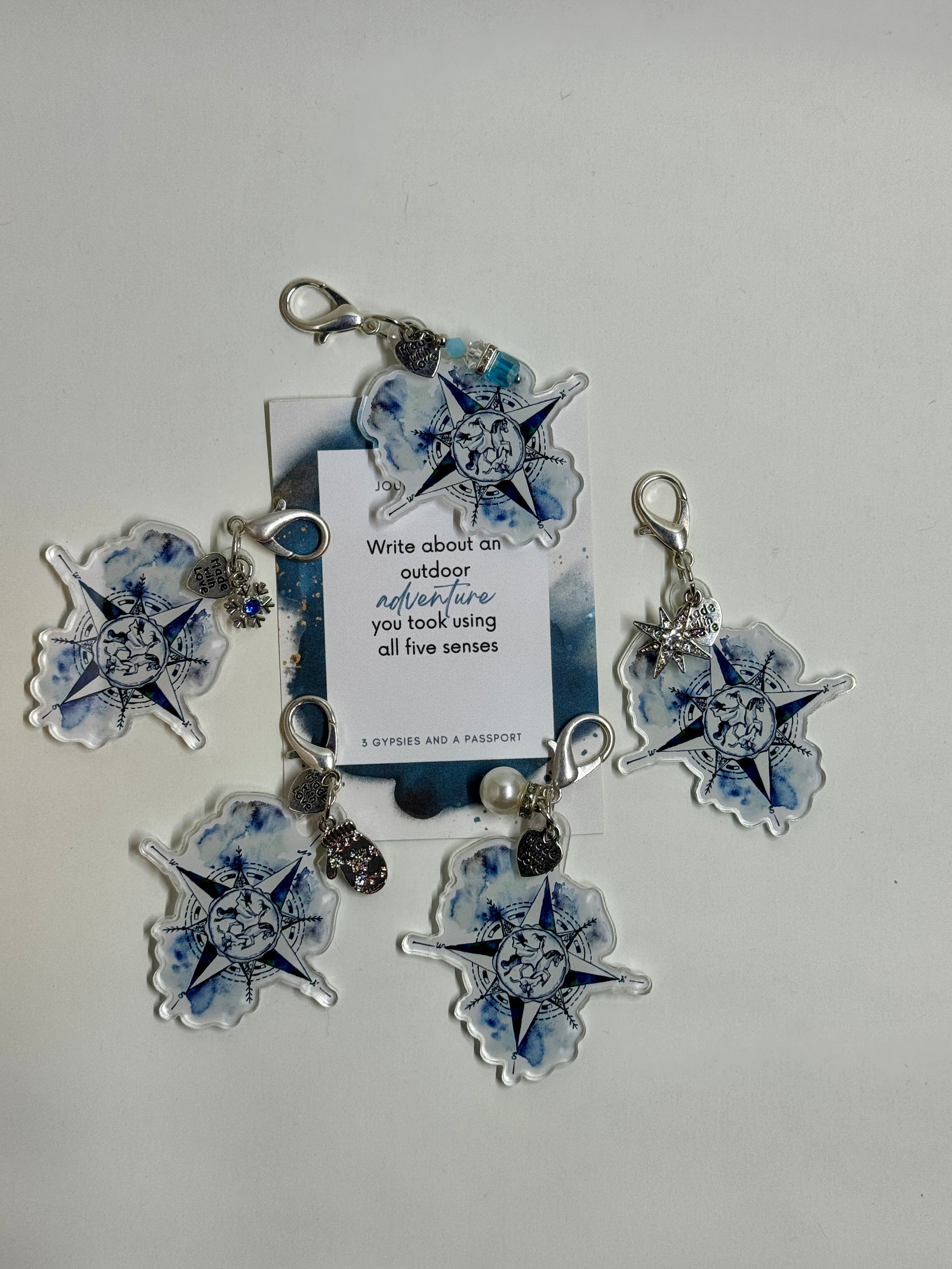 Planner charms and journal card on white background
