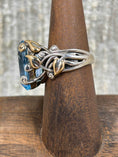 Load image into Gallery viewer, Side view of Sterling Silver and 18K Gold, this blue topaz ring by Barbara Bixby is stunning. Vintage
