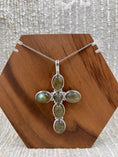 Load image into Gallery viewer, Labradorite Cross Pendant with Sterling Silver Chain on wood block with white background
