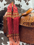 Load image into Gallery viewer, Coral and Peach Beaded Necklace on saddle purse with cowhide background
