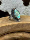 Load image into Gallery viewer, Abalone and Marcasite Sterling SIlver Ring on wood block with cowhide background
