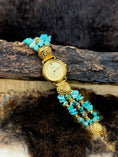 Load image into Gallery viewer, Vintage Angie Dickinson Turquoise Watch on wood block on dark fur background
