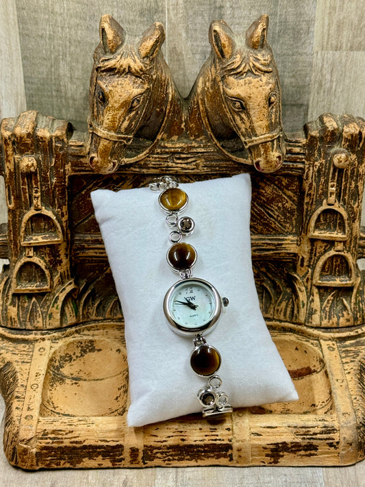 Tigers Eye and Sterling Silver Watch  on horse stand with wood background