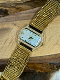 Load image into Gallery viewer, Peugeut Gold and Crystal Ladies Watch on wood background
