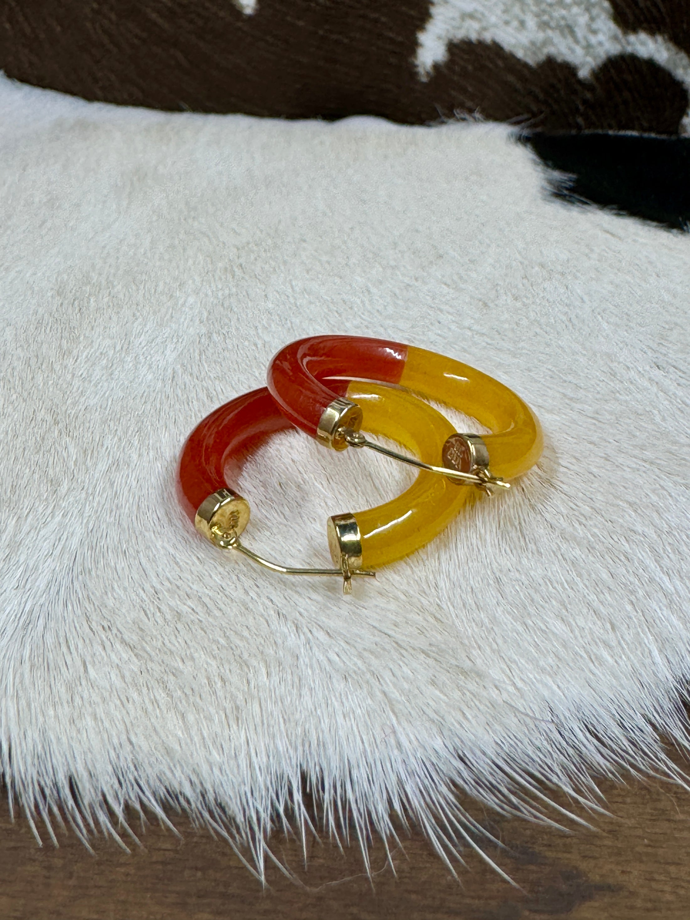 14K Yellow Gold and Bi-Color Jade Hoop Earrings on cowhide