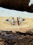 Load image into Gallery viewer, Side view Garnet Butterfly and Sterling Earrings on wood block with cowhide background
