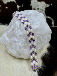 Load image into Gallery viewer, Genuine Opal and Amethyst Bracelet on white rock and cowhide background
