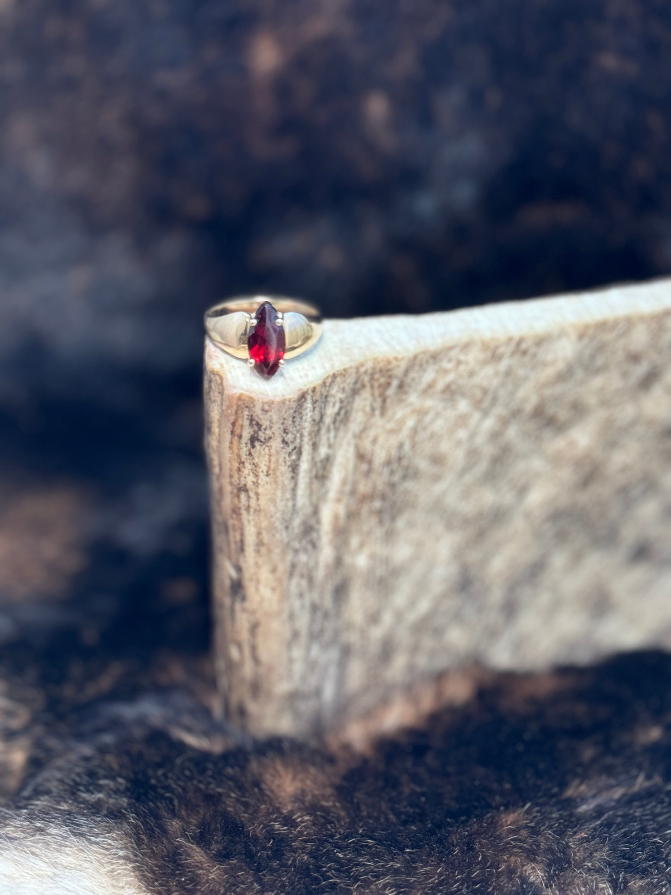 Goregous Diamond Swirl Ring on moose antler with fur background