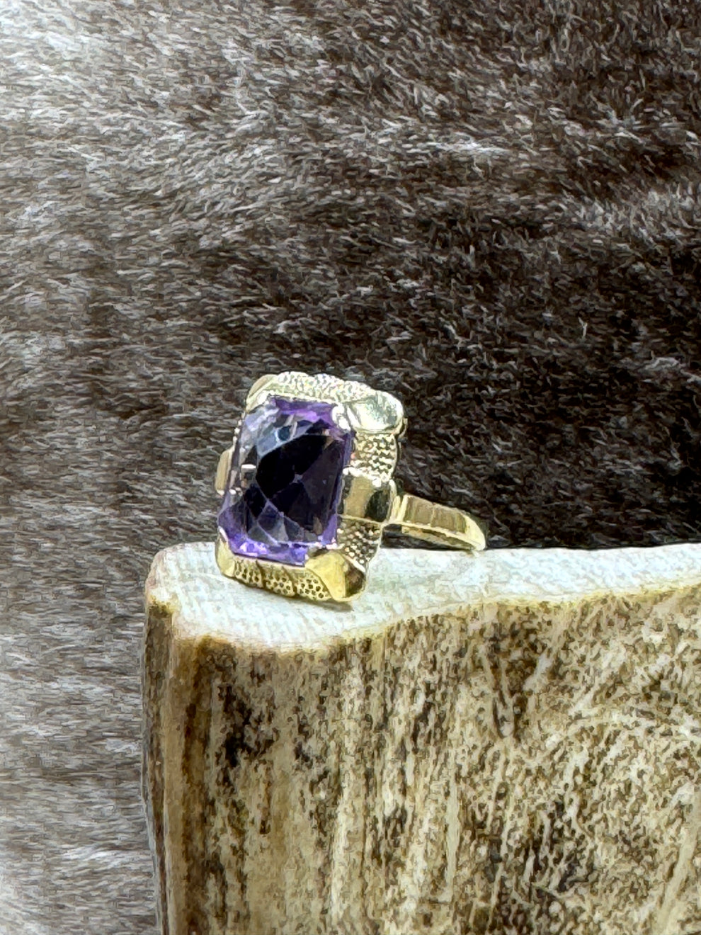 Vintage Amethyst and 14K Gold Ring on moose antler with fur background